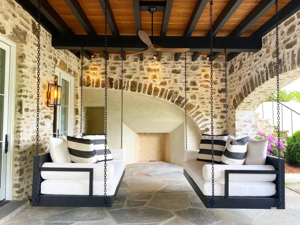 Lowcountry swing beds hanging from a front porch