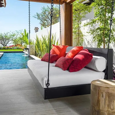 Swing bed by the pool